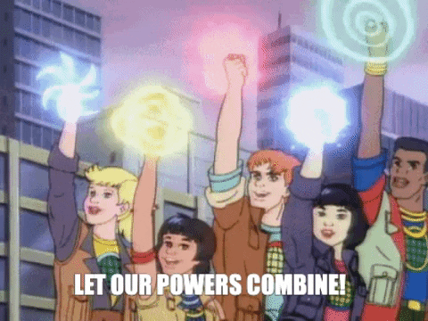 5 super heroes holding their hands up with different colors of light and saying "Let our powers combine!"