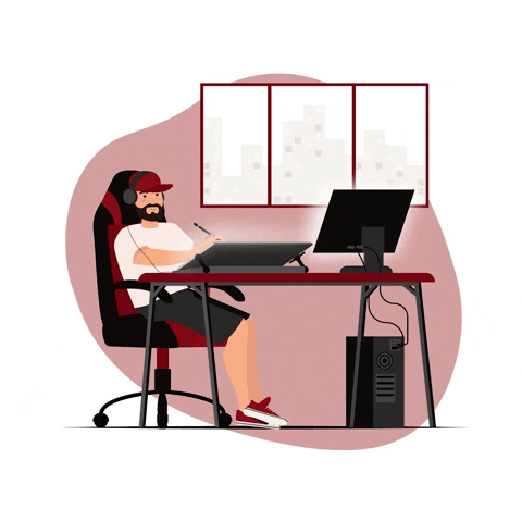 storyboard illustrator working at his desk on his computer singing with headphones and a cap on his head