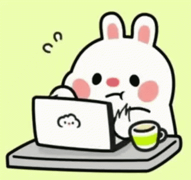 mouse like character typing on its laptop fast and its bumping its coffee cup