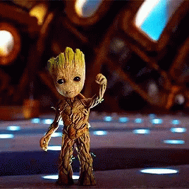 Groot from guardians of the galaxy waving its hand in the air to say goodbye with a space craft and lights behind it