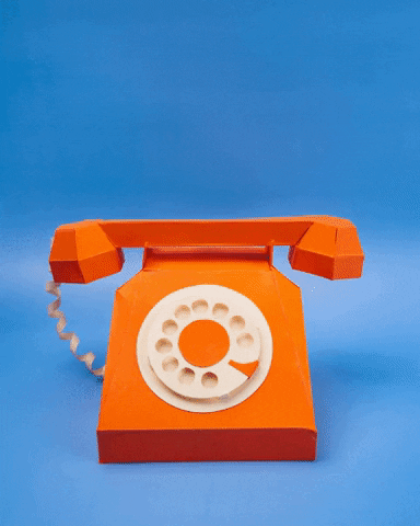 a paper cut out animation of a telephone that lifts itself up and the word "hello!' comes out of it