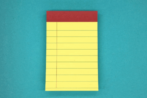 a pink and blue pencil writing patterned lines on a yellow note pad against a blue background