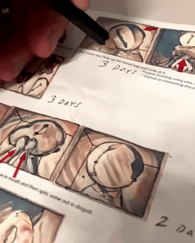 an animator drawing an arrow on a storyboard of abstract characters