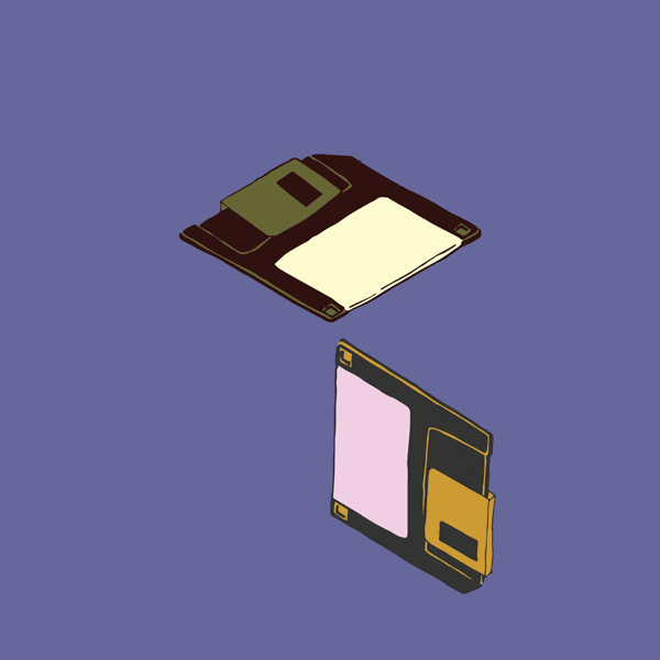 two floppy discs flying around and connecting with each other to make the shape of a laptop
