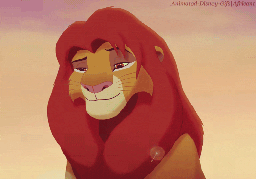 Simba from the lion king tilting his head to the one side and smiling