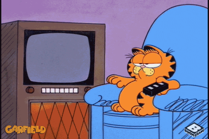 Garfield sitting on a blue lounge sofa and turning the tv on with a remote and a man is talking and he turns the tv off right away 
