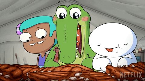TheOdd1sOut with a crocodile and a girl licking their lips in front of a lot of food