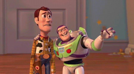 Buzz from Toy Story showing something to Woody and smiling and looking excited whilst Woody looks worried
