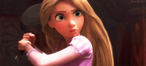 a scene from Tangled where she is holding a pan in a defensive stance and looks left and right in a concerned manner